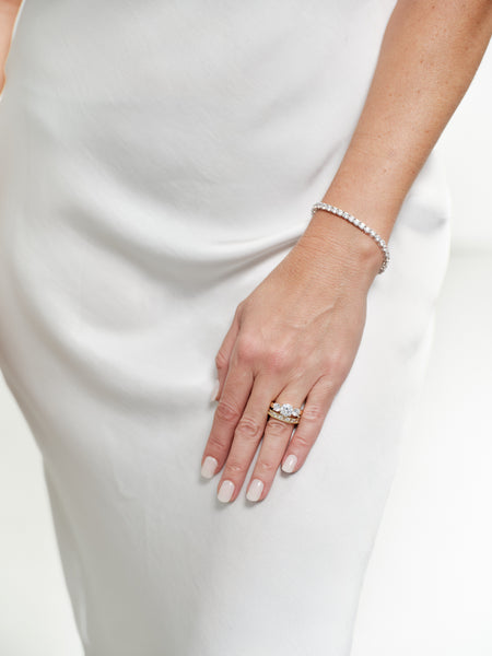R2547 -GP MEG- Gold Plate 3 Stone Claw Set Cubic Zirconia Ring