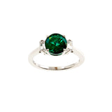 R1805-G NIXI Rhodium clear baguette cz and green round claw set ring