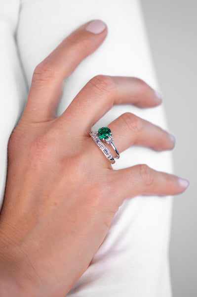 R1805-G NIXI Rhodium clear baguette cz and green round claw set ring