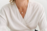 N1138-GP - ARIE - Yellow gold claw set cz & pearl pendant on fine chain