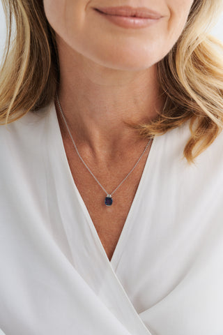 P23-S - ERIN - Rhodium Plated Tapered CZ And Sapphire Blue Square Pendant