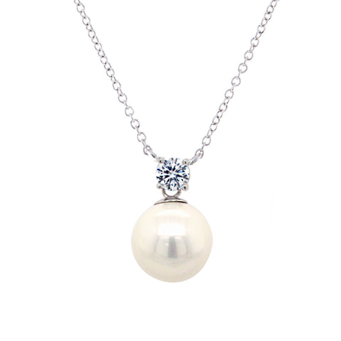 P78-RH - Rhodium  claw set cz & pearl pendant on fine chain