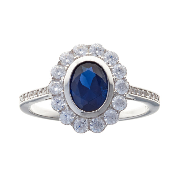 R11792 - Rhodium sapphire & clear cz ring